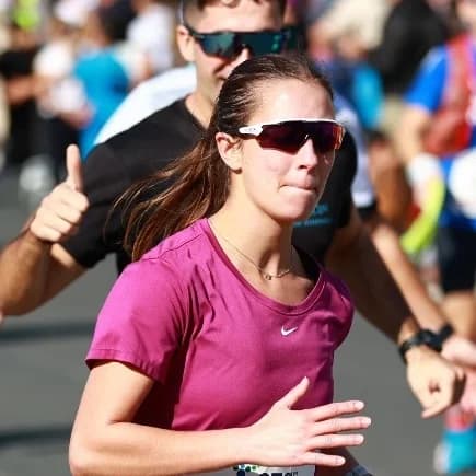 Stavri Totou celebrating after completing a marathon